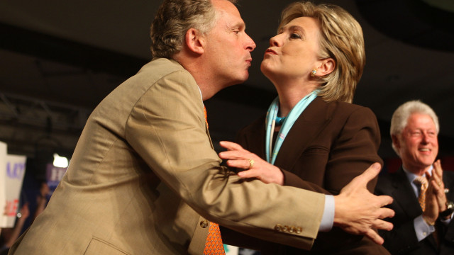 LOUISVILLE, KY - MAY 20: Democratic presidential hopeful Sen. Hillary Clinton (D-NY) (R) gets a kiss from her campaign manager Terry McAuliffe at an election night rally at the Marriott Hotel May 20, 2008 in Louisville, Kentucky. Clinton defeated her opponent Democratic presidential hopeful Sen. Barack Obama (D-IL) in the Kentucky primary by a wide margin, but Obama was favored to come out ahead in the Oregon primary. (Photo by Scott Olson/Getty Images)